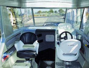 The internal layout of the boat is spacious and functional. The skipper and passenger seats sit atop fully moulded seat boxes that have plenty of storage for lifejackets, food or fishing tackle.